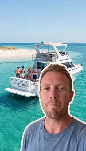 A green screen ad: an actor cut out at the bottom of the frame talks in front of a photo of a motor boat in turquoise water, an ad for a boat rental app.