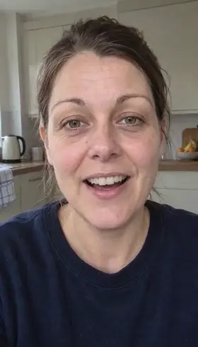 An actor in her kitchen, still in her work jumper, talks to the camera about dinner, an ad for a meal kit.